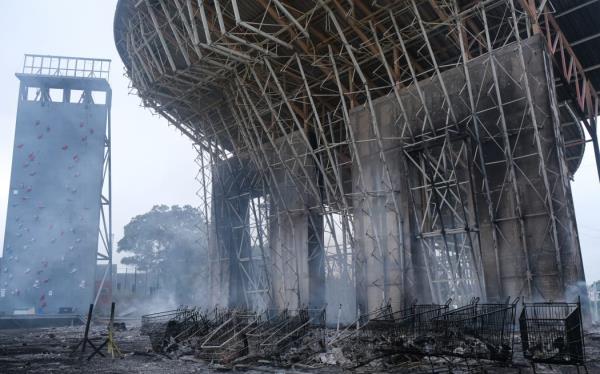 A burnt climbing wall is pictured in the Magenta district of Noumea on May 15, 2024 amid protests l<em></em>inked to a debate on a co<em></em>nstitutional bill aimed at enlarging the electorate for upcoming elections of the overseas French territory of New Caledonia.