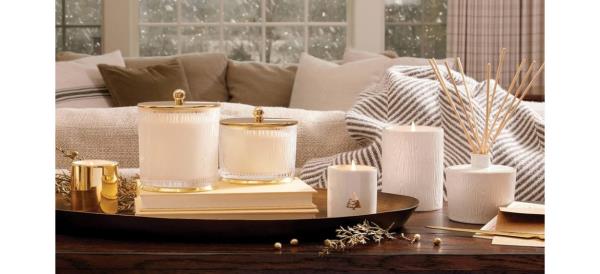 Thymes Frasier Fir Candles on coffee table