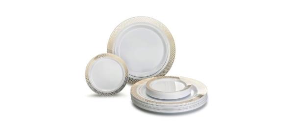 A set of white plastic plates with gold borders