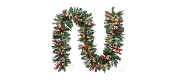 Christmas garland with lights, berries and pineco<em></em>nes on it