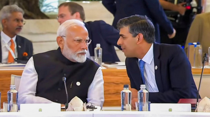 Prime Minister Narendra Modi shakes hands with Japan’s Prime Minister Fumio Kishida at the G7 summit at the Borgo Egnazia resort, in Savelletri, Italy.