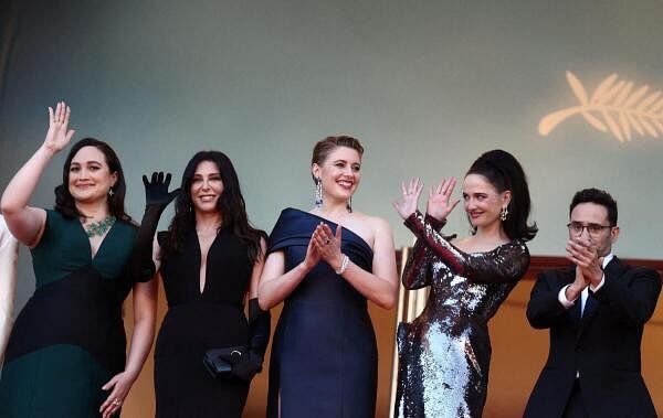 Greta Gerwig, Jury President of the 77th Cannes Film Festival, and Jury members, Lily Gladstone, Nadine Labaki, Eva Green and Juan Anto<em></em>nio Bayona pose on the red carpet to attend the closing ceremony of the 77th Cannes Film Festival in Cannes, France, May 25