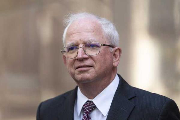 Attorney John Eastman, the architect of a legal strategy aimed at keeping former President Do<em></em>nald Trump in power, talks to reporters after a hearing in Los Angeles, June 20, 2023.