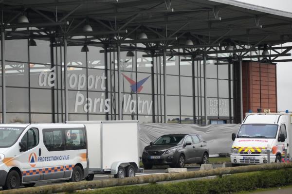 Rescue vehicles park outside the Vatry airport, eastern France, Saturday, Dec. 23, 2023 in Vatry, eastern France. a<em></em>bout 300 Indian citizens heading to Central America were sequestered in a French airport for a third day Saturday because of an investigation into suspected human trafficking, authorities said. The 15 crew members of the Legend Airlines charter flight en route from United Arab Emirates to Nicaragua were questio<em></em>ned and released, according to a lawyer for the small Romania-ba<em></em>sed airline. (AP Photo/Christophe Ena)
