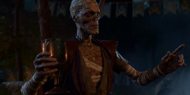 Withers speaks to guests at Patch 5 epilogue party with cup in hand in Baldur's Gate 3
