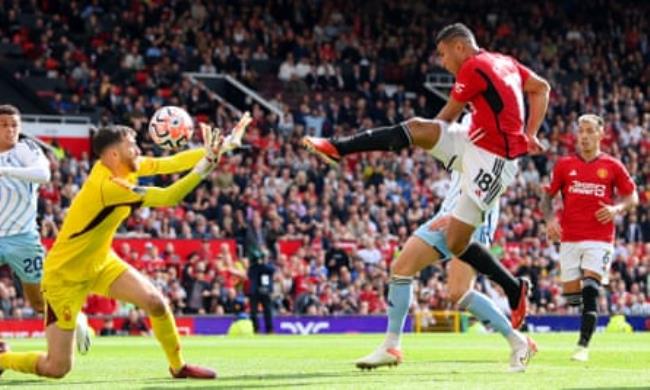Casemiro of Manchester United scores the team’s second goal past Matt Turner of Nottingham Forest during the Premier League match between Manchester United and Nottingham Forest at Old Trafford