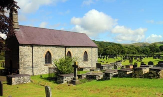 The church of St Mary and the hills above Teifi Pools.