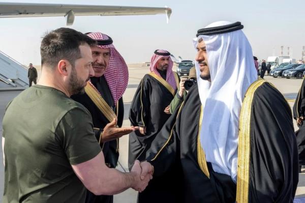 In this photo provided by Saudi Press Agency, SPA, Ukrainian President Volodymyr Zelenskyy is greeted by Prince Mohammed bin Abdulrahman bin Abdulaziz, Deputy Governor of Riyadh, upon his arrival at King Khalid Internatio<em></em>nal Airport, in Riyadh, Saudi Arabia, Tuesday, Feb. 27, 2024. (Saudi Press Agency via AP)