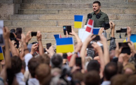 Volodymyr Zelensky addresses a crowd outside the Danish parliament